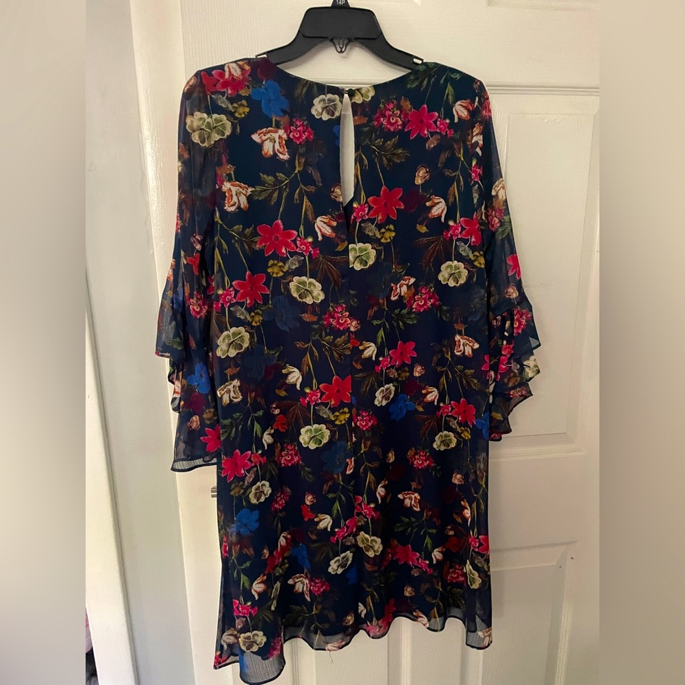 Calvin Klein 
Beautiful, new condition, light flowing dress, bell sleeves.